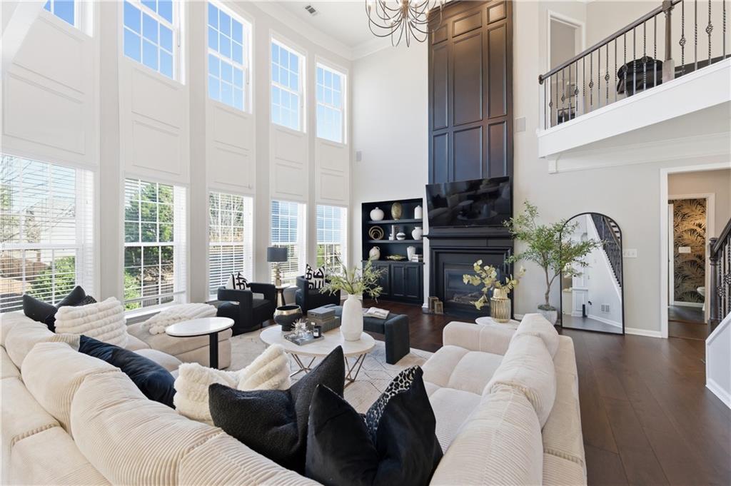 3173 Abbey Place Southwest Atlanta, GA 30331 - Photo 10 of 56 a living room with fireplace furniture and a large window