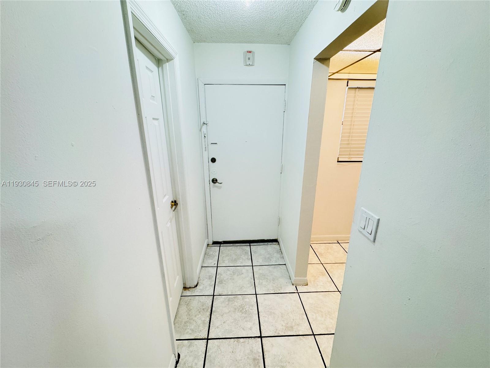 2800 Northwest 56th Avenue, Unit D102 Lauderhill, FL 33313 - Photo 16 of 25 a view of a hallway