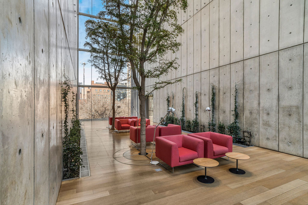 565 Broome Street, Unit S8B Manhattan, NY 10013 - Photo 15 of 31 a view of a room with furniture and wooden walls