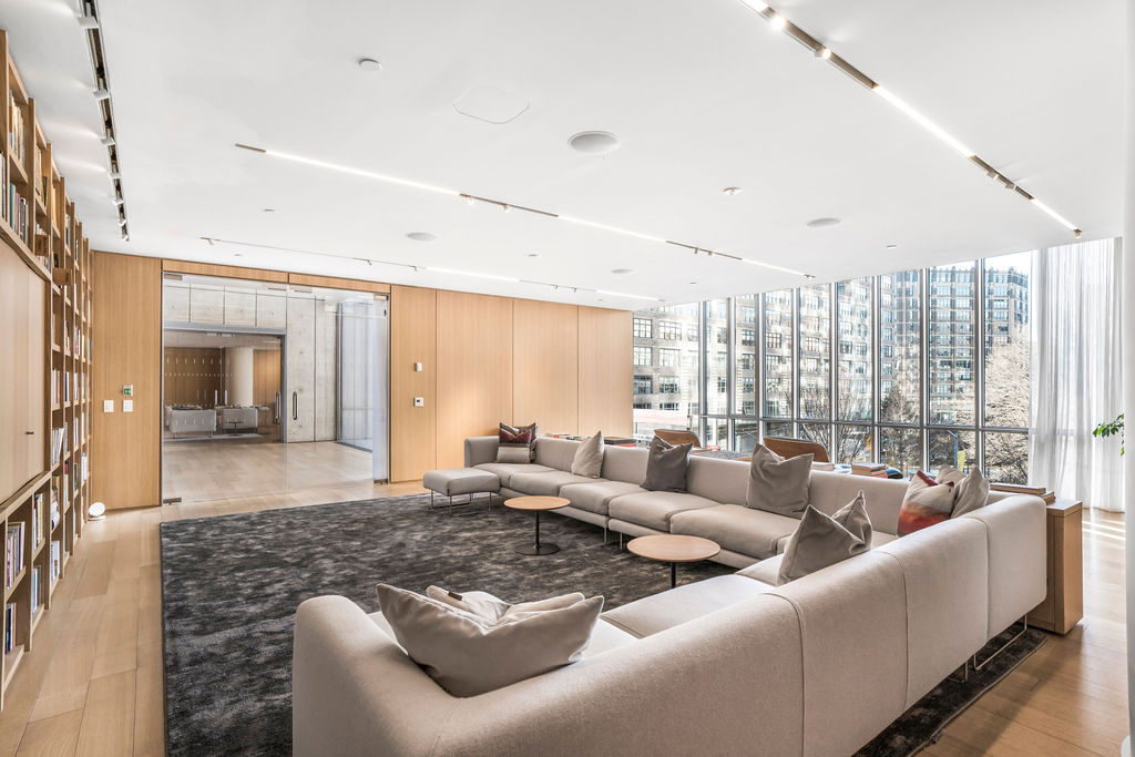 565 Broome Street, Unit S8B Manhattan, NY 10013 - Photo 22 of 31 a living room with furniture and a large window