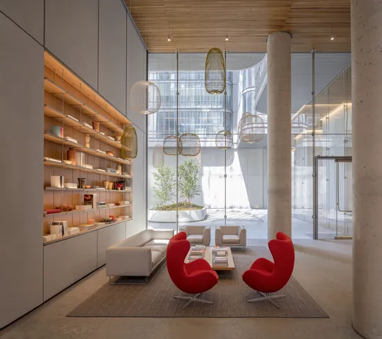 a room with lots of potted plants