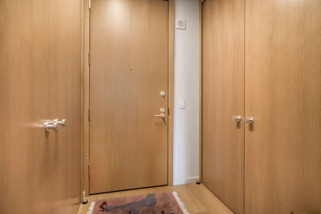a bathroom with a sink toilet and mirror