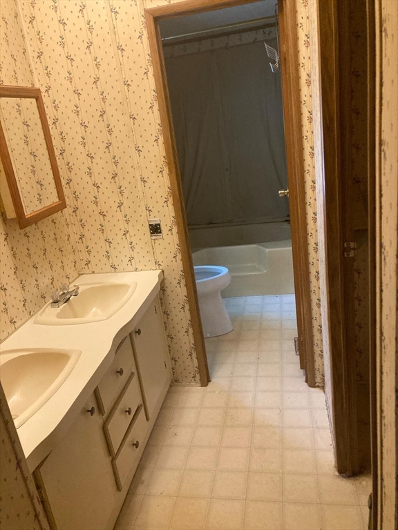 504 Loop Road Savoy, MA 01256 - Photo 8 of 12 a bathroom with a sink a toilet and shower