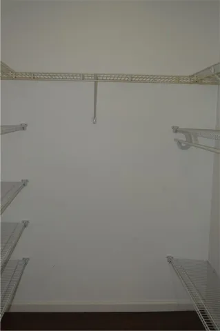 a view of small space with racks on the wall