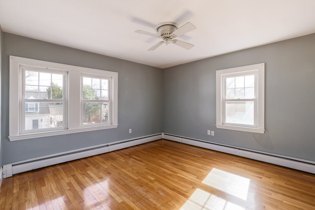 8 Smith Avenue Reading, MA 01867 - Photo 21 of 32 a view of an empty room with a window