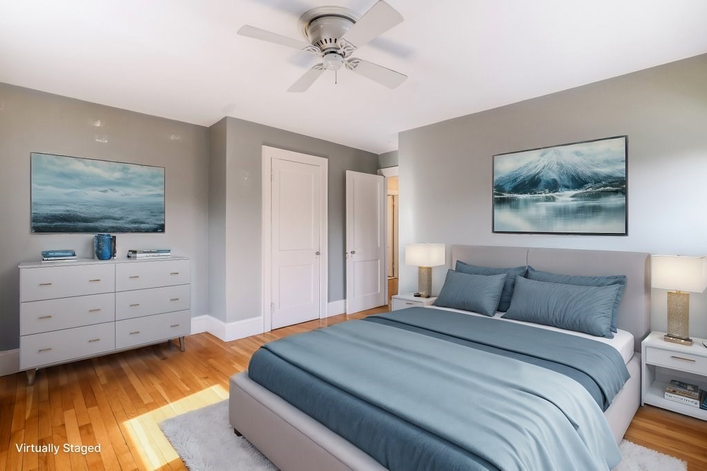 8 Smith Avenue Reading, MA 01867 - Photo 23 of 32 a bedroom with a bed and a flat screen tv