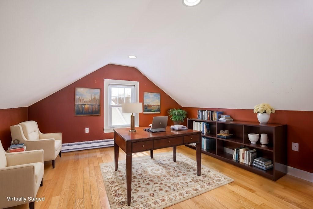 8 Smith Avenue Reading, MA 01867 - Photo 27 of 32 a living room with furniture and a wooden floor