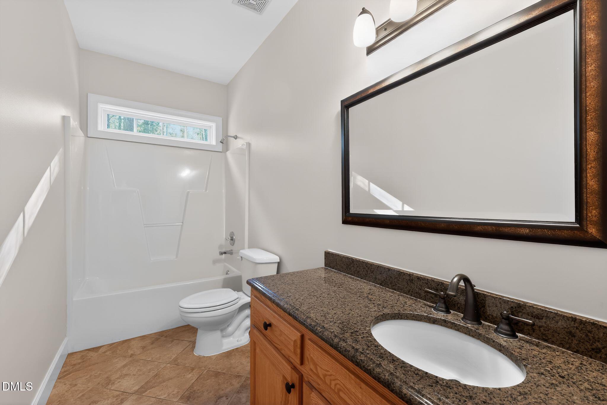 2212 Wheelerbrook Court Raleigh, NC 27603 - Photo 13 of 15 14_2212_Wheelerbrook_Ct_Raleigh_NC_27603