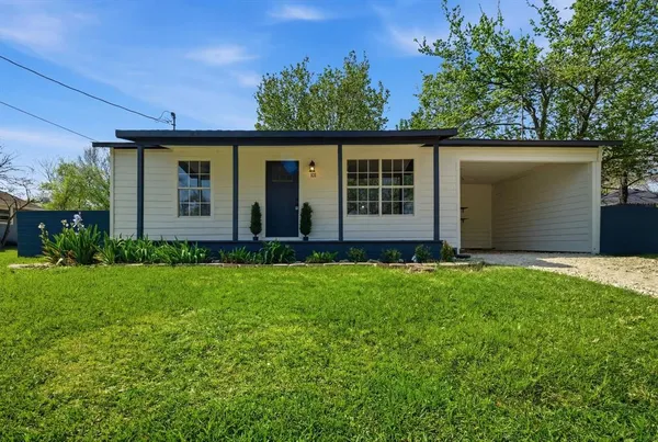 front view of house with a yard