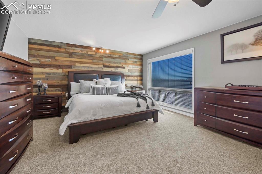 3815 Sierra Vista Road Monument, CO 80132 - Photo 17 of 44 a bed room with a bed and a window