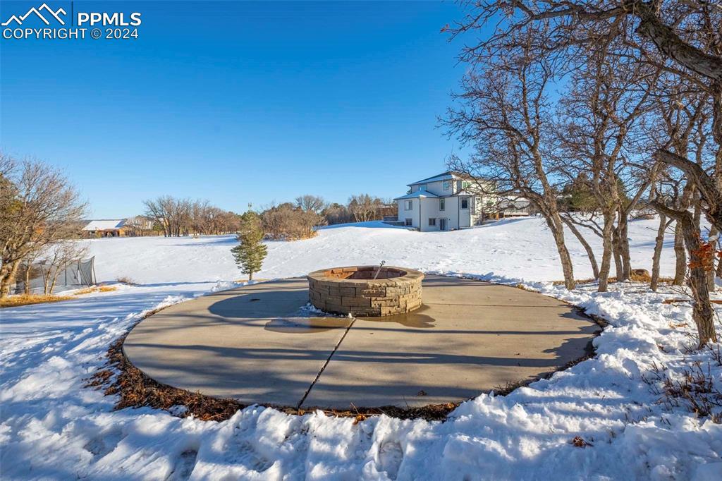 3815 Sierra Vista Road Monument, CO 80132 - Photo 31 of 44 a view of a house with a snow