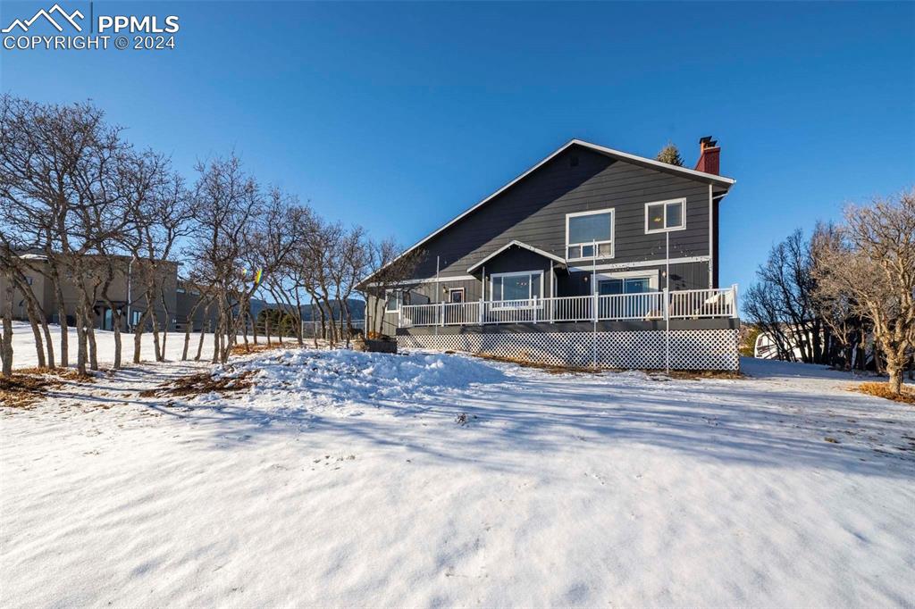 3815 Sierra Vista Road Monument, CO 80132 - Photo 33 of 44 a front view of a house with a yard