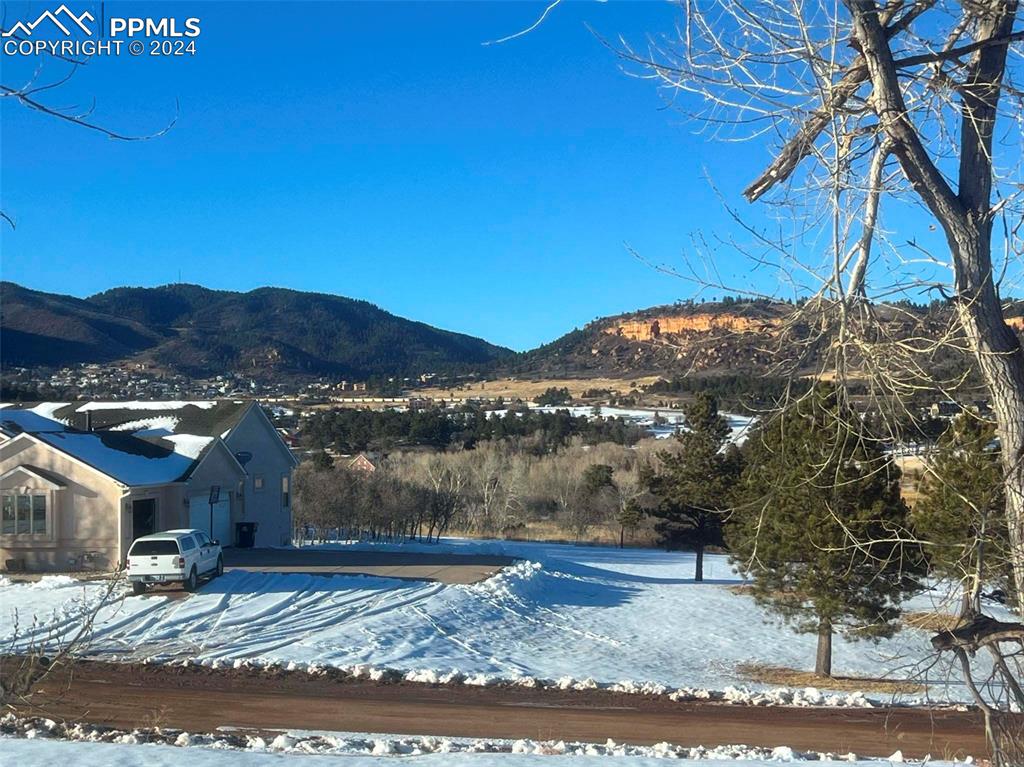 3815 Sierra Vista Road Monument, CO 80132 - Photo 36 of 44 a view of a house with a yard