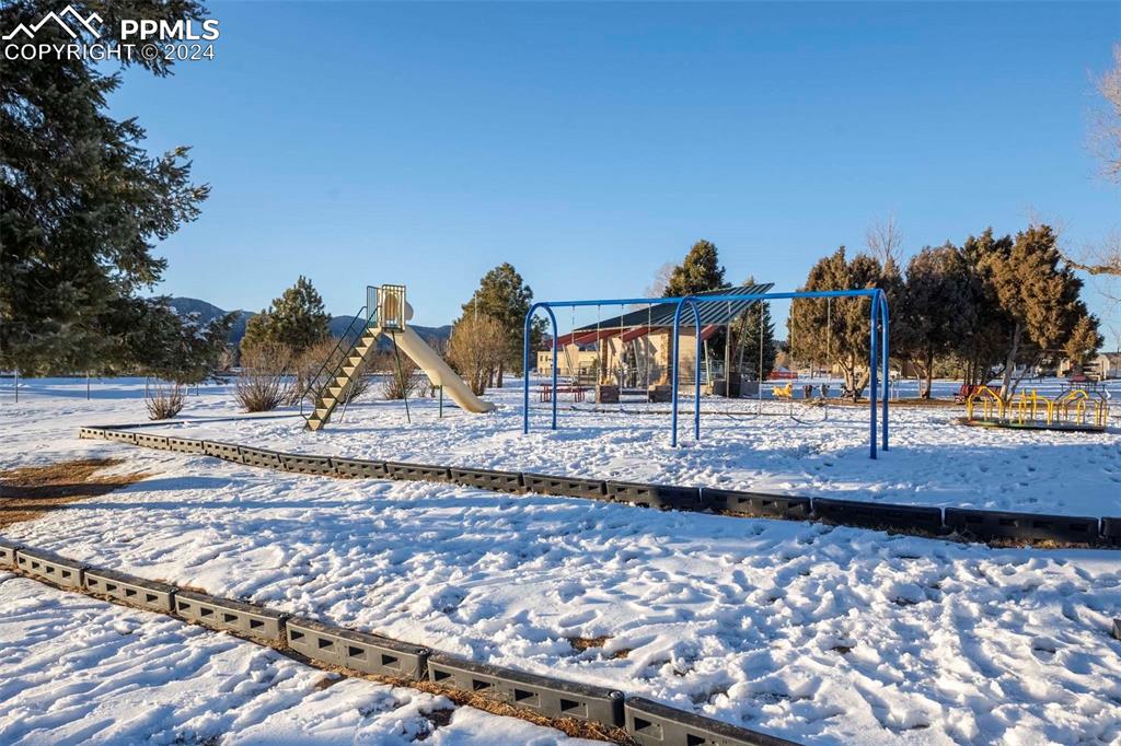 3815 Sierra Vista Road Monument, CO 80132 - Photo 39 of 44 a view of a park with swings and slides