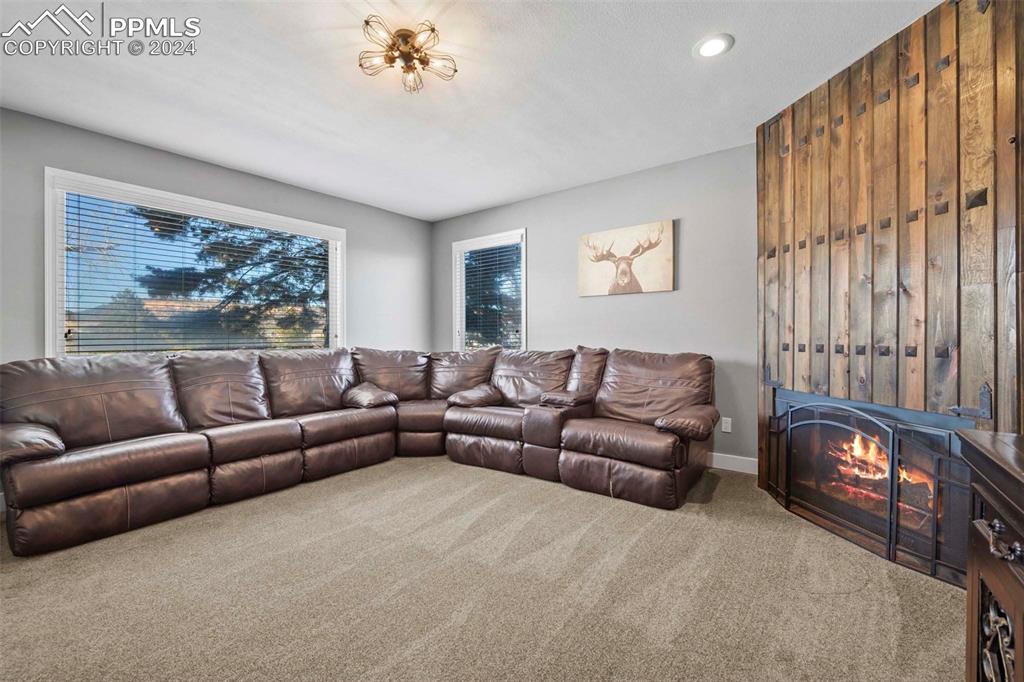 3815 Sierra Vista Road Monument, CO 80132 - Photo 6 of 44 a living room with furniture and a large window