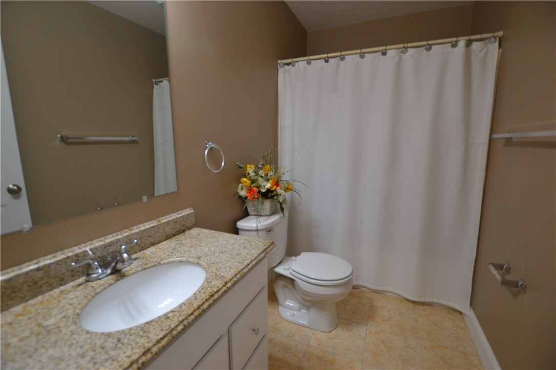 517 Pleasant Street Pawtucket, RI 02860 - Photo 21 of 24 Second floor main bathroom with tub and shower