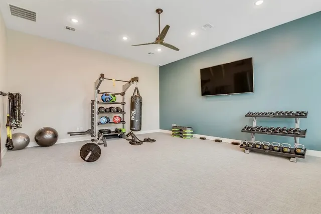 a view of a room with gym equipment