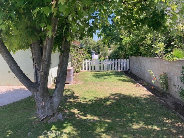 4948 Granada Avenue Riverside, CA 92504 - Photo 7 of 33 a view of a backyard with large trees