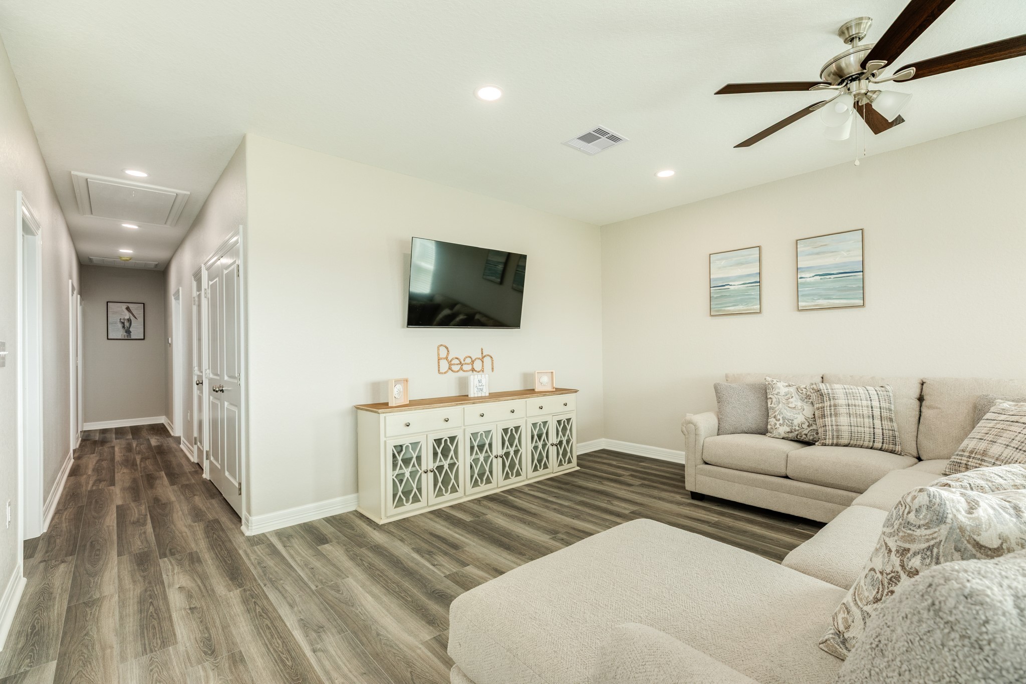 524 Thunder Road Surfside Beach, TX 77541 - Photo 11 of 26 With a hall to the bedrooms and baths