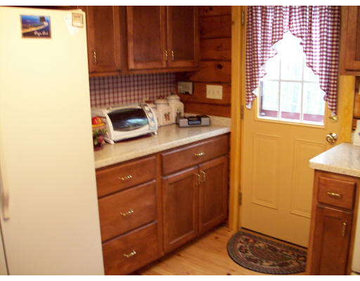 39 Casey Road Spencer, MA 01562 - Photo 7 of 22 a kitchen with a sink and cabinets