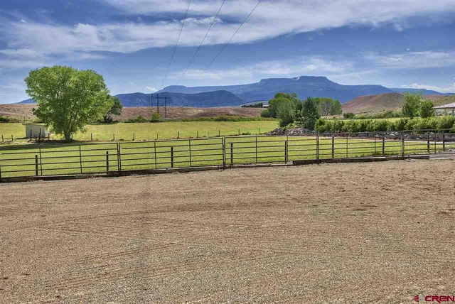 a view of an ocean and a mountain
