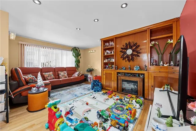 a bedroom with furniture and a fireplace