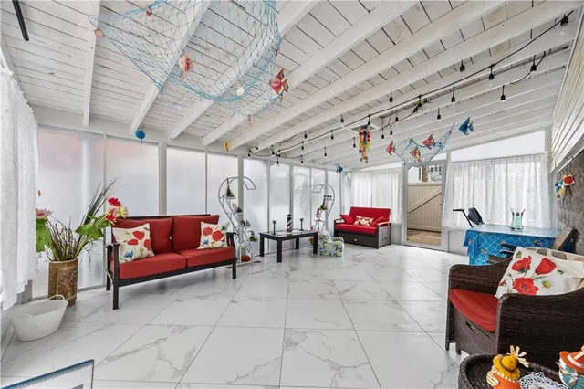 a living room with furniture and a couch