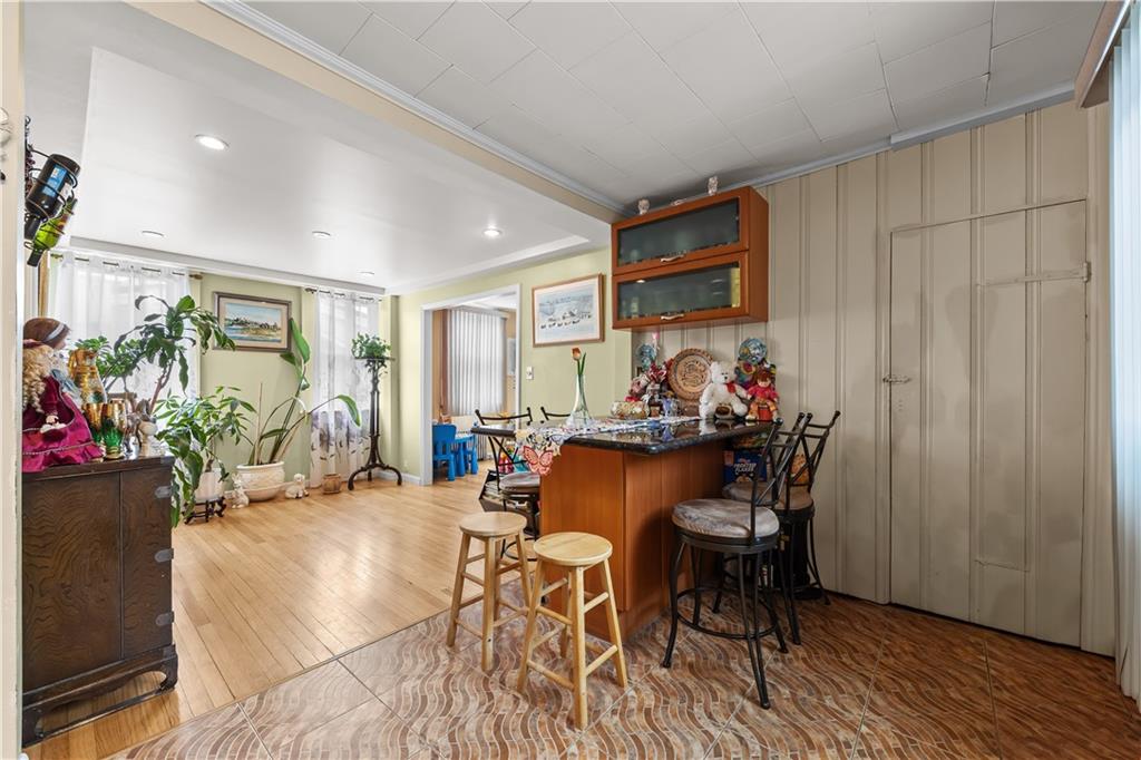 8 Lester Court Brooklyn, NY 11229 - Photo 9 of 25 a view of a dining room with furniture and a livingroom