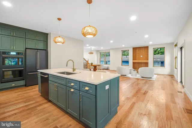 a kitchen with a table and chairs in it