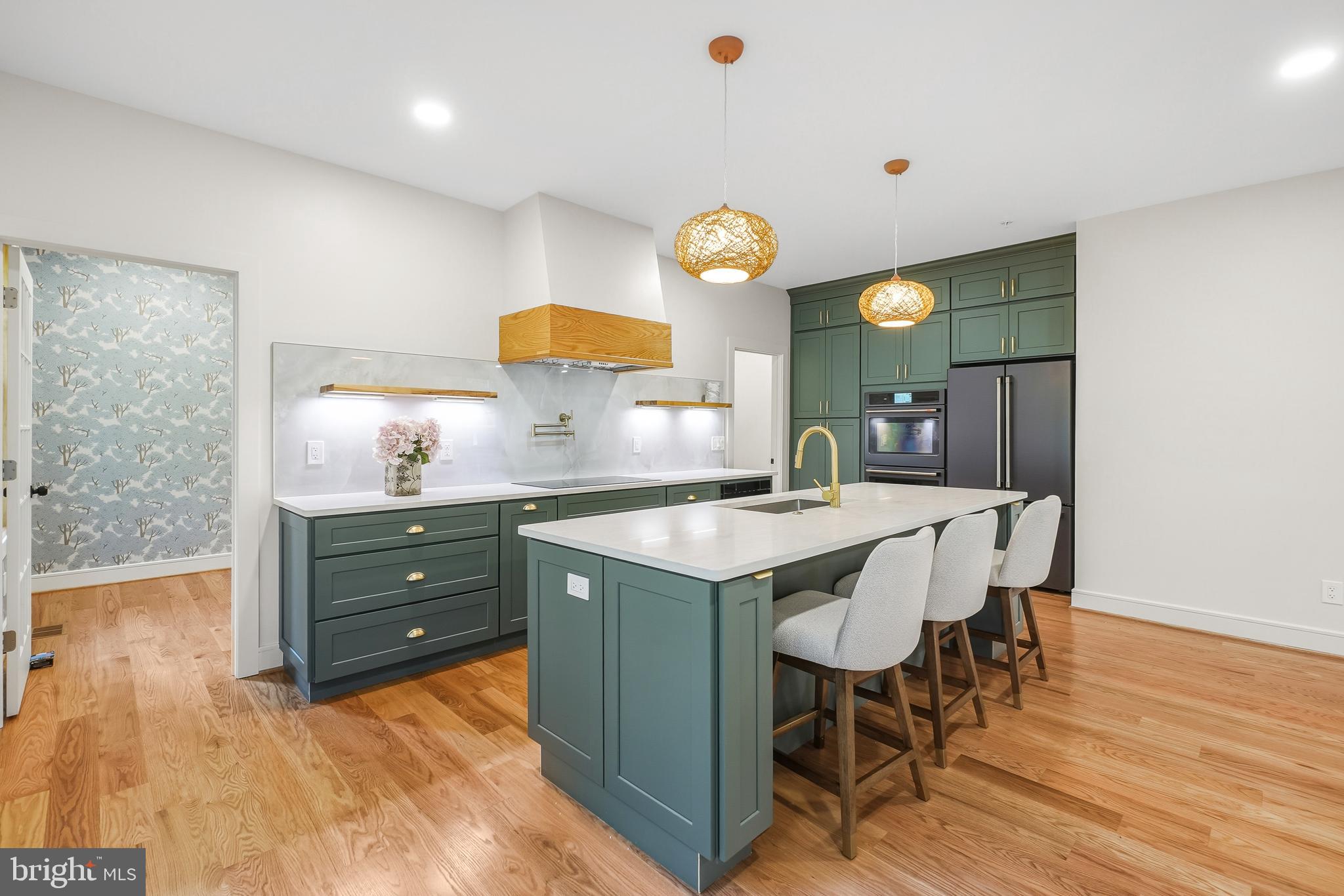 110 Geneva Avenue Silver Spring, MD 20910 - Photo 18 of 61 a kitchen with a table and chairs in it