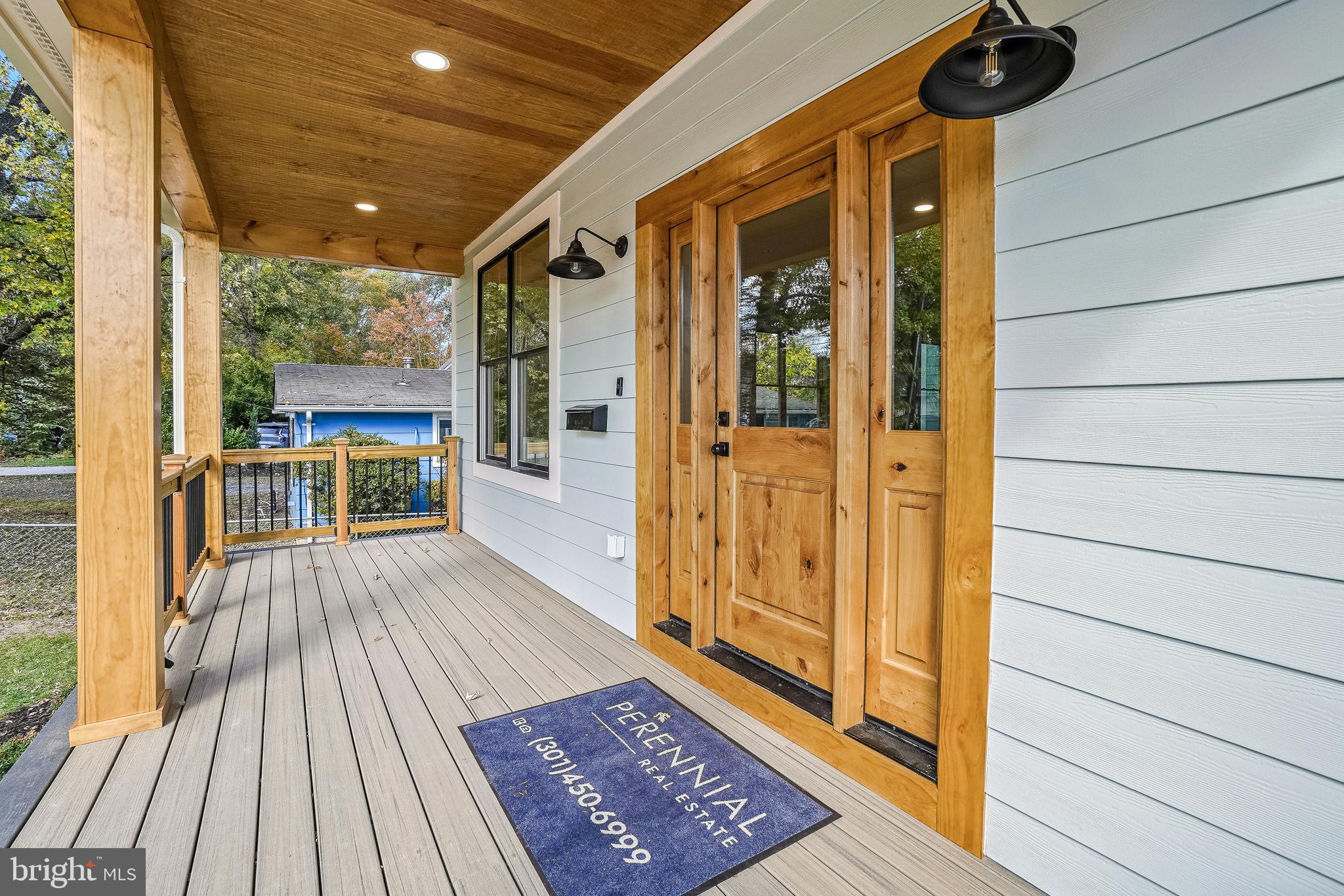 110 Geneva Avenue Silver Spring, MD 20910 - Photo 3 of 62 Expansive Covered Front Porch with a Wood Ceiling