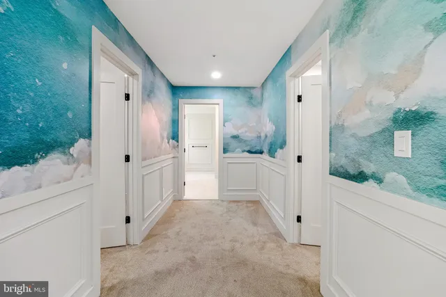 a bedroom with a bed and a night stand