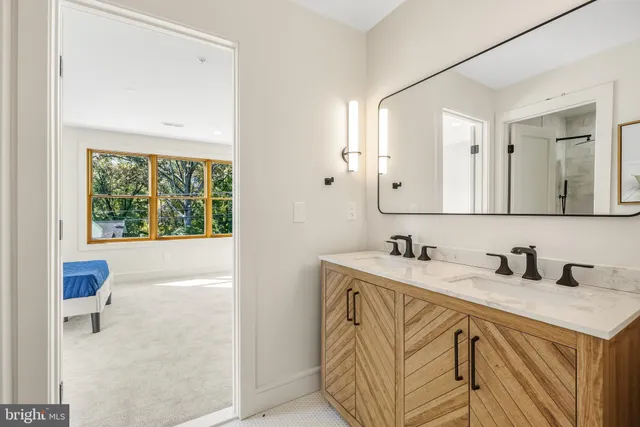 a living room with furniture and stairs