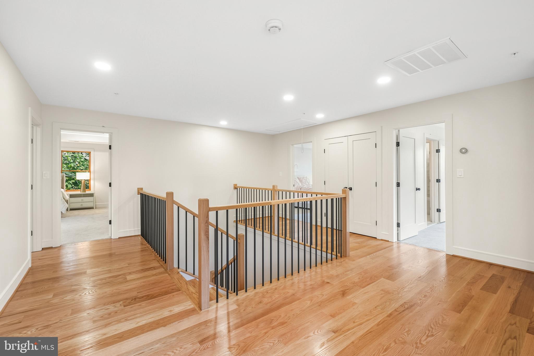 110 Geneva Avenue Silver Spring, MD 20910 - Photo 41 of 61 a view of a hallway with wooden floor