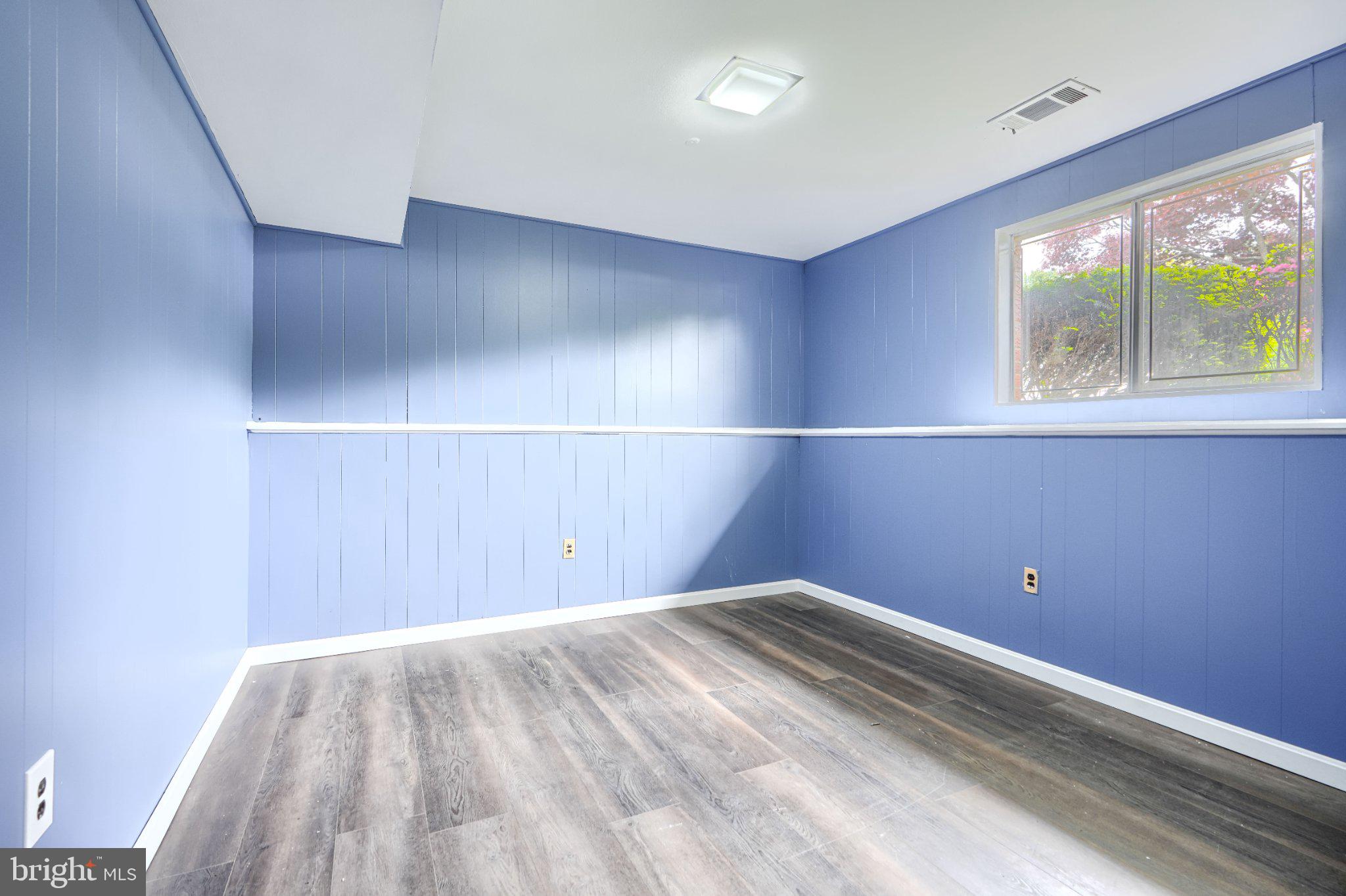3910 Carthage Road Randallstown, MD 21133 - Photo 37 of 42 Bright blue room with natural light.