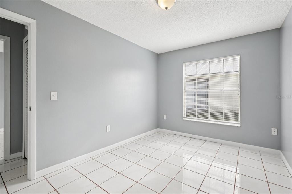 734 Bittern Lane Kissimmee, FL 34759 - Photo 26 of 55 a view of an empty room and window