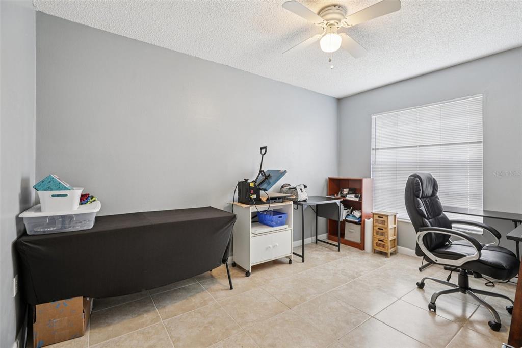734 Bittern Lane Kissimmee, FL 34759 - Photo 34 of 55 a living room with furniture and a piano