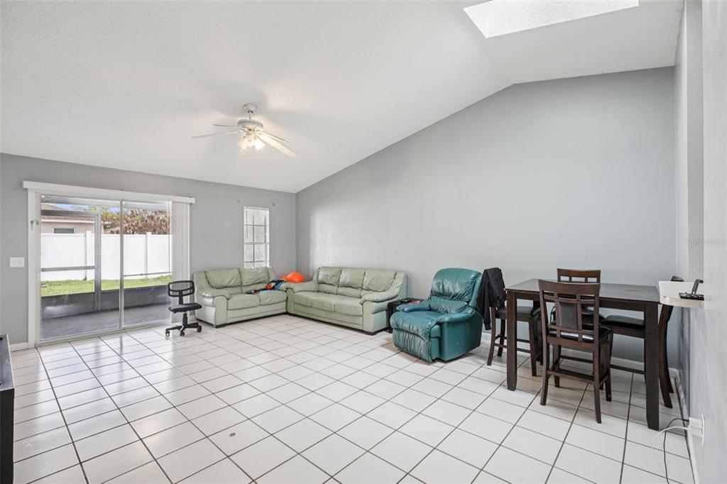 734 Bittern Lane Kissimmee, FL 34759 - Photo 42 of 55 a living room with furniture and a window