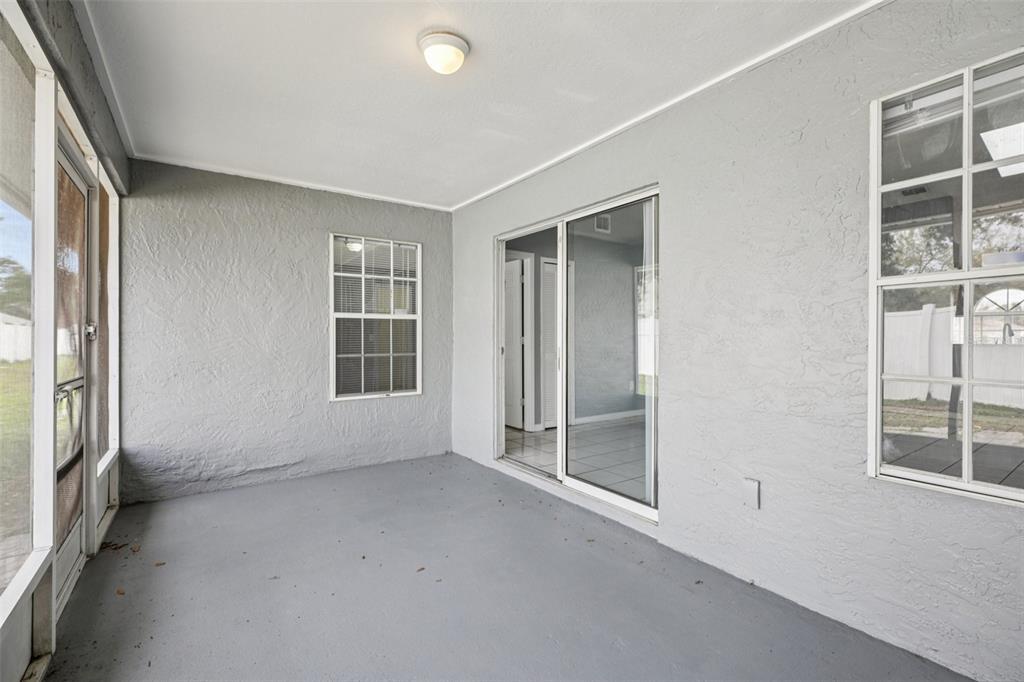 734 Bittern Lane Kissimmee, FL 34759 - Photo 50 of 55 an empty room with windows