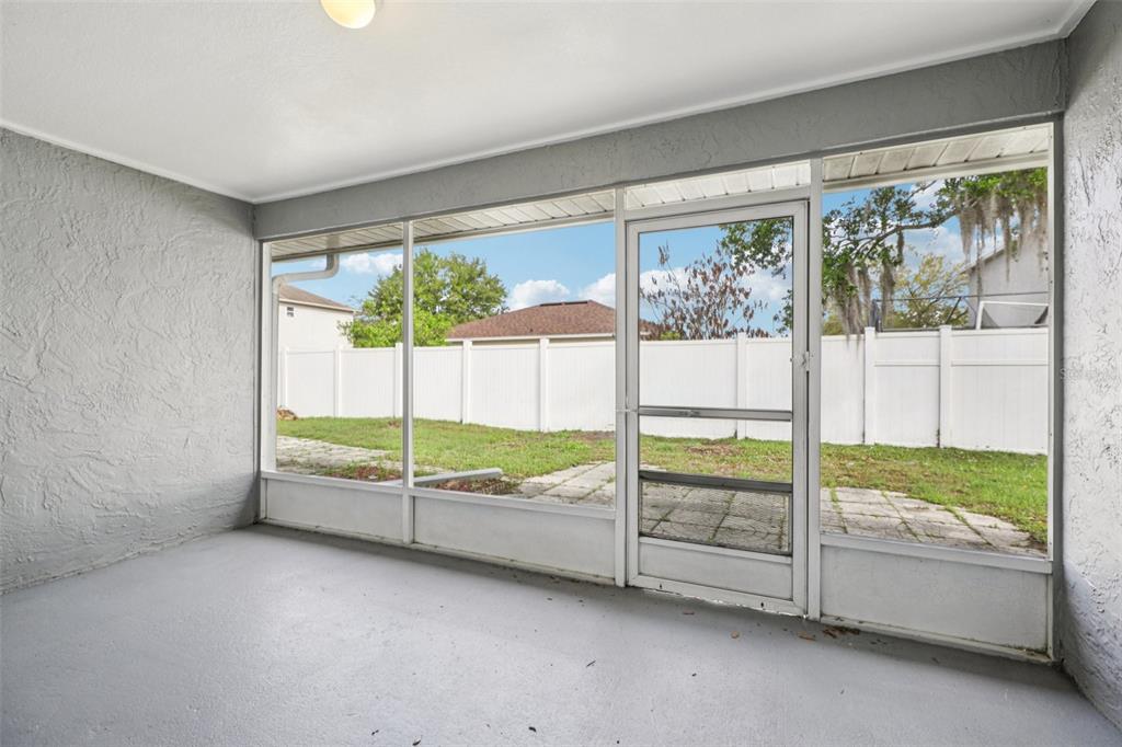 734 Bittern Lane Kissimmee, FL 34759 - Photo 51 of 55 a view of an empty room and window
