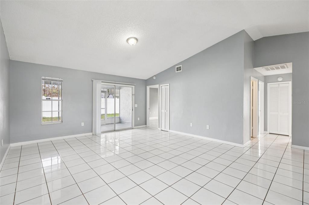 734 Bittern Lane Kissimmee, FL 34759 - Photo 8 of 55 a view of an empty room and window