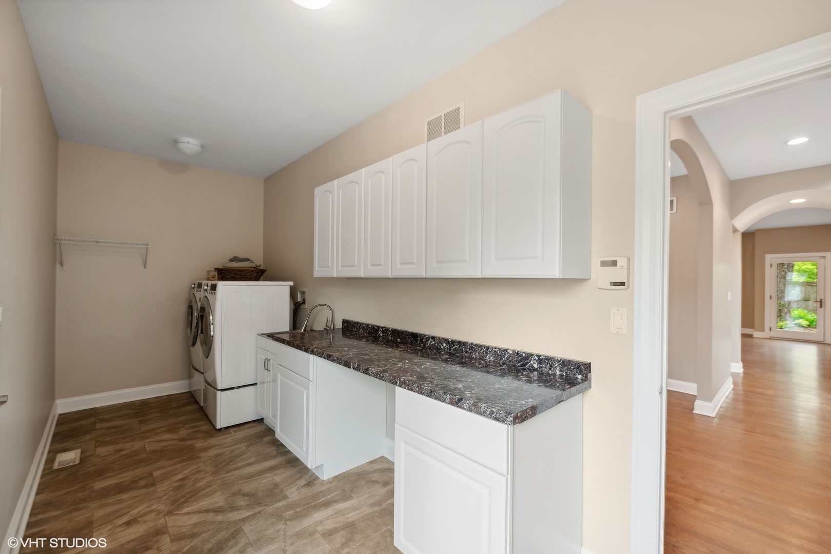 423 Sumac Road Highland Park, IL 60035 - Photo 15 of 31 a kitchen with granite countertop a sink and a stove top oven