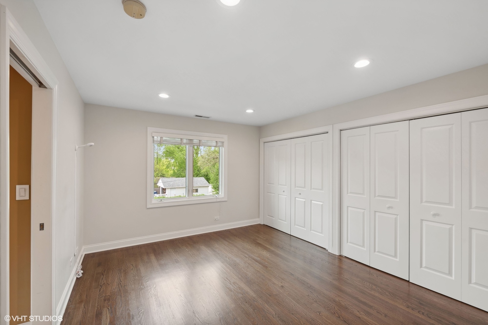 423 Sumac Road Highland Park, IL 60035 - Photo 20 of 31 an empty room with wooden floor and windows