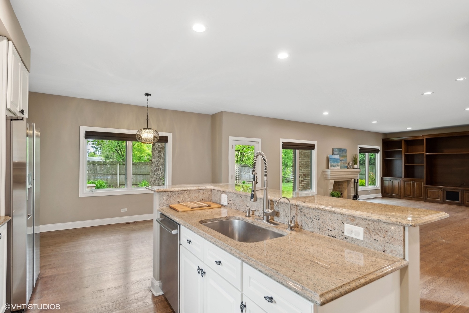 423 Sumac Road Highland Park, IL 60035 - Photo 6 of 31 a kitchen with sink stove and refrigerator