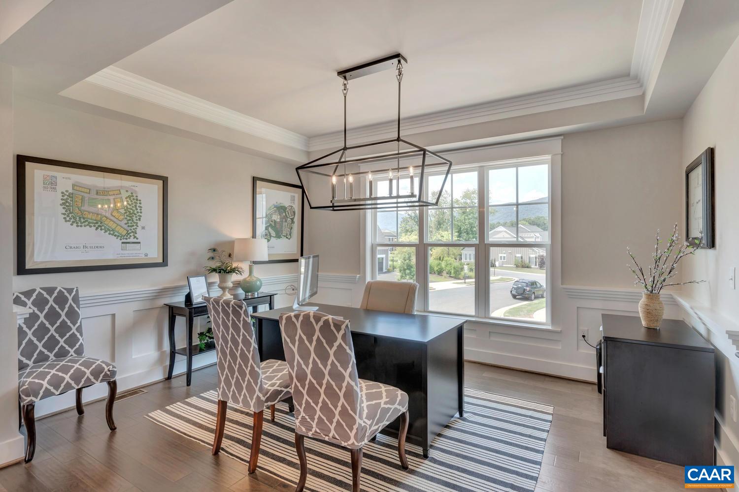 3518 Rowcross Street Crozet, VA 22932 - Photo 12 of 50 a view of a dining room with furniture window and outside view