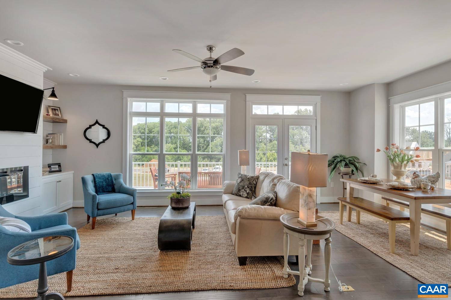 3518 Rowcross Street Crozet, VA 22932 - Photo 16 of 50 a living room with furniture and a large window