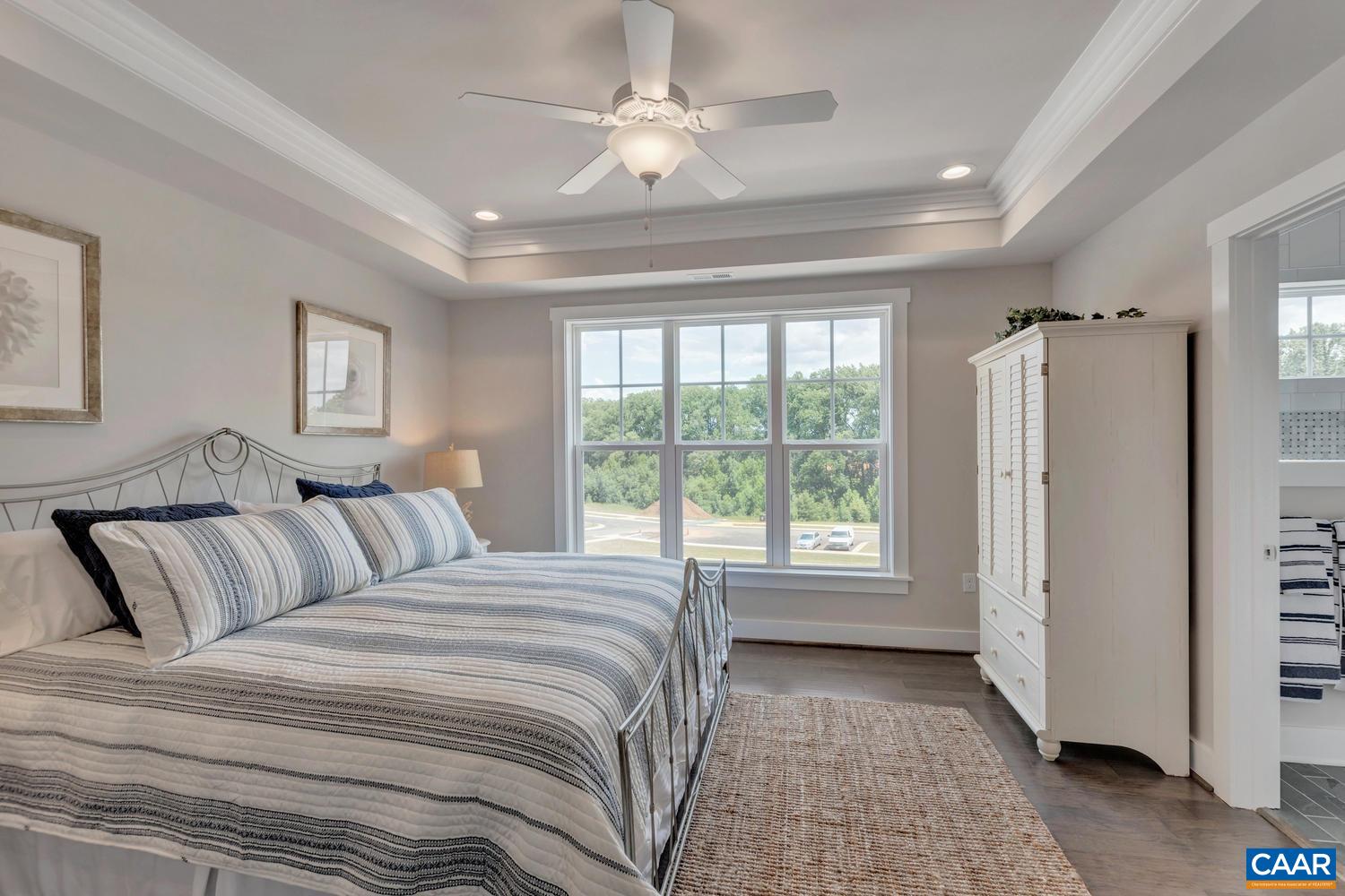 3518 Rowcross Street Crozet, VA 22932 - Photo 20 of 50 a bedroom with a large bed and a window