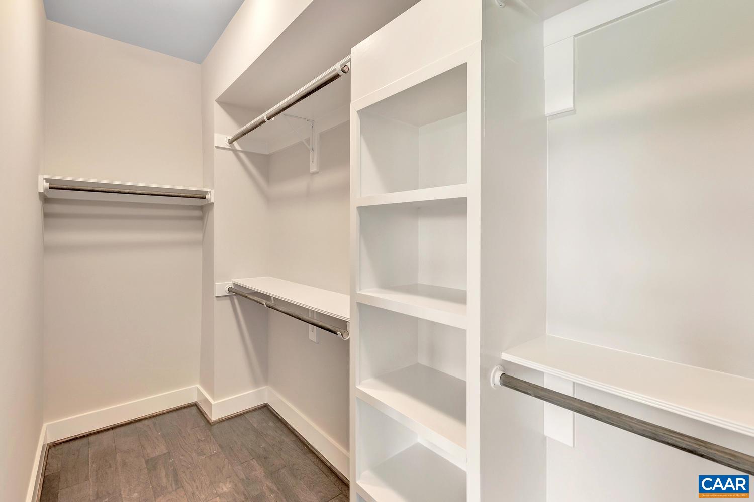 3518 Rowcross Street Crozet, VA 22932 - Photo 23 of 50 a view of walk in closet with empty racks