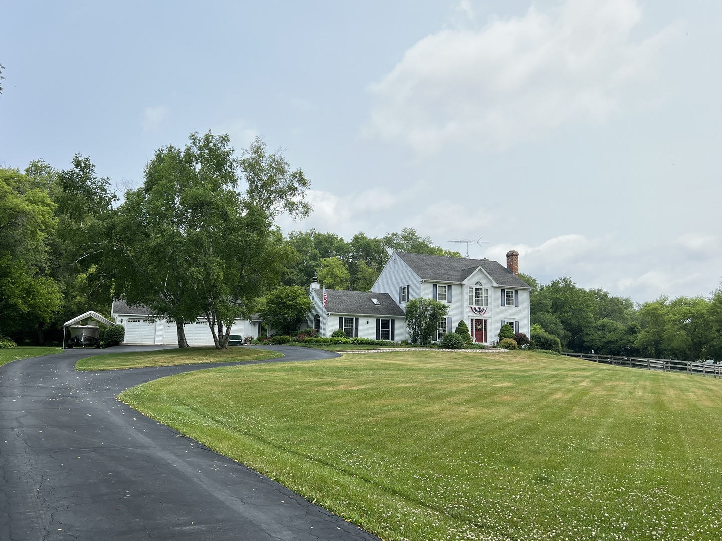 2 Middlebury Road Barrington Hills, IL 60010 - Photo 6 of 8 a view of a big house with a big yard and large trees