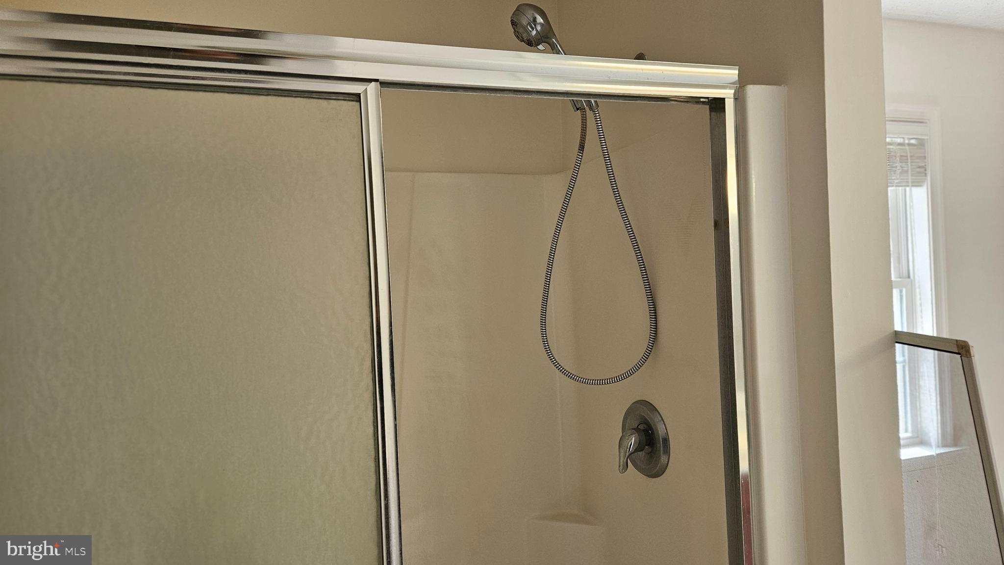 10495 Green Leaf Place La Plata, MD 20646 - Photo 16 of 24 a bathroom with a glass shower door